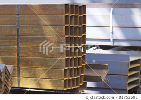 Metal profile pipe of rectangular cross section in packs at the warehouse of metal products Metal profile pipe of rectangular cross section in packs at the warehouse of metal products 81752693