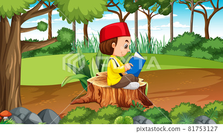 Brunei kids wears traditional clothes and reading a book in the forest Brunei kids wears traditional clothes and reading a book in the forest 81753127