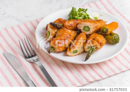Chicken wrapped in asparagus Chicken wrapped in asparagus 81757033