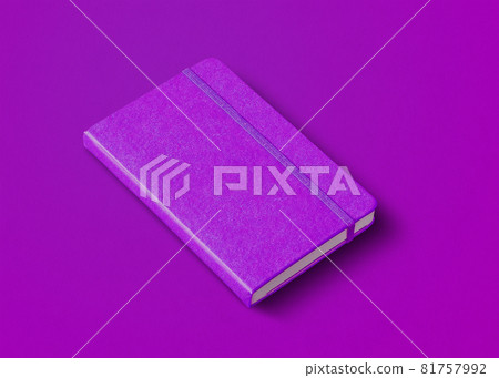 Purple closed notebook isolated on color background 81757992
