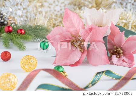 Christmas image: Pink poinsettia and decorations Christmas image: Pink poinsettia and decorations 81758062