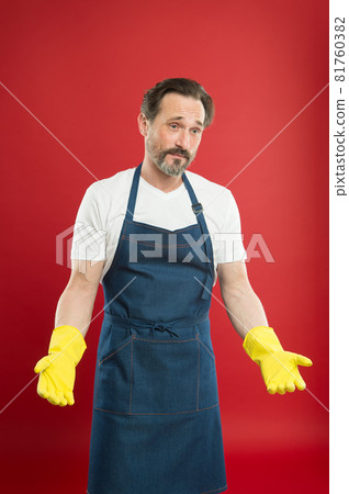 Tradition of quality cleaning. Cleaning man red background. Tradition of quality cleaning. Cleaning man red background. 81760382