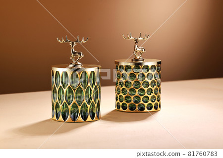 Empty green Glass jar on beige background 81760783