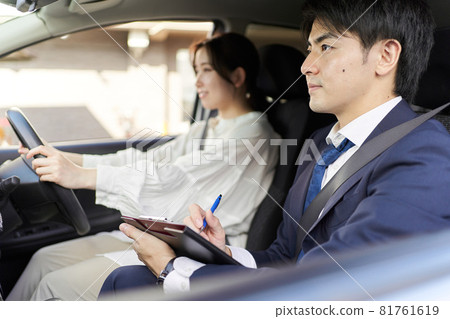 Male instructor giving driving lessons Male instructor giving driving lessons 81761619