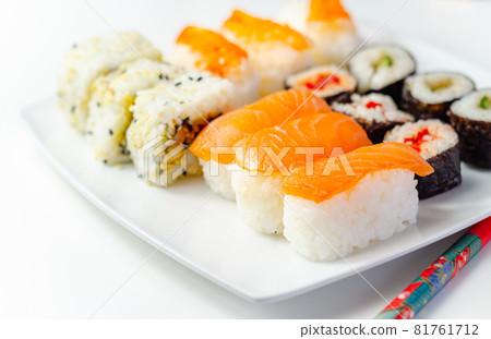 Set of smoked salmon nigiri, Ebi king prawn nigiri, katsu chicken and red pepper California roll, cucumber with wasabi hosomaki roll and red pepper hosomaki roll Set of smoked salmon nigiri, Ebi king prawn nigiri, katsu chicken and red pepper California roll, cucumber with wasabi hosomaki roll and red pepper hosomaki roll 81761712