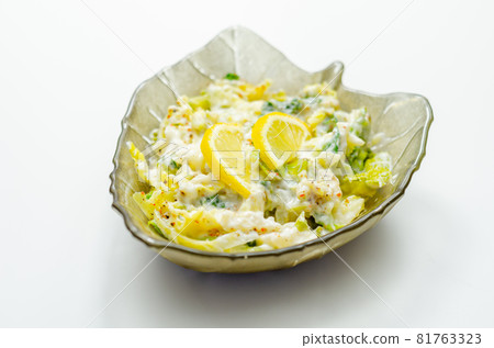 Delicious and fresh salad with savoy cabbage and spring greens in a smooth creamy sauce Delicious and fresh salad with savoy cabbage and spring greens in a smooth creamy sauce 81763323