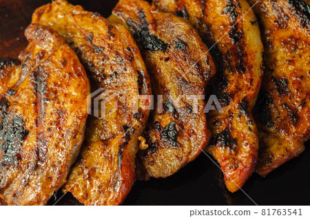 Fresh and juicy pork loin steaks,  grilled meats on the wooden board 81763541