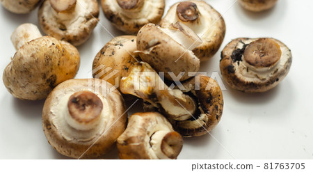 Raw and fresh mushrooms on a white background, vegetables from an organic farm 81763705