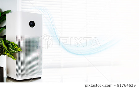 air purifier a living room, air cleaner removing fine dust in house. protect PM 2.5 dust and air pollution concept 81764629