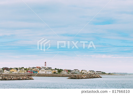 Alnesgard, Godoya, Norway. Old Alnes Lighthouse In Summer Day In Godoy Island Near Alesund Town. Alnes Fyr Alnesgard, Godoya, Norway. Old Alnes Lighthouse In Summer Day In Godoy Island Near Alesund Town. Alnes Fyr 81766810
