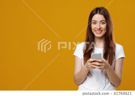 Excited millennial fair-haired woman gaming on smartphone Excited millennial fair-haired woman gaming on smartphone 81769821