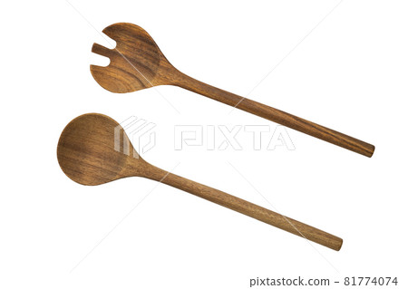 Two wooden spoons , kitchen accessories on white background isolated Two wooden spoons , kitchen accessories on white background isolated 81774074