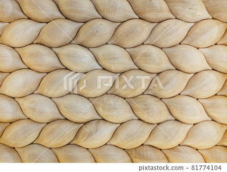Traditional ecological consistent cladding of a wall with brown wooden larch fish scales, wood shingles, clapboard, clapboard texture background  81774104