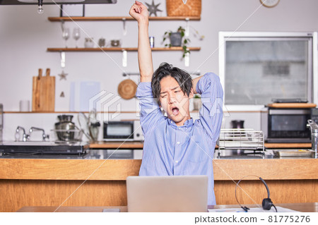 Telework (remote) tired young man 81775276