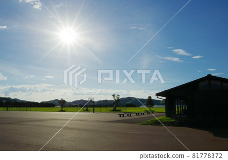 Scenery of a park event square with the summer afternoon sun, blue sky and white clouds Scenery of a park event square with the summer afternoon sun, blue sky and white clouds 81778372