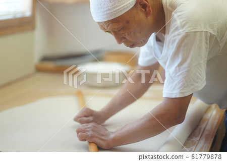 Man hitting buckwheat Man hitting buckwheat 81779878