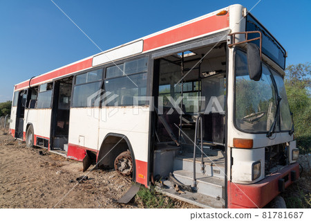 Old, aged, abondened, rotten and rusty vehicles stay in a automobile dumpster in a rural area. Recycling concept in junk yard. 81781687