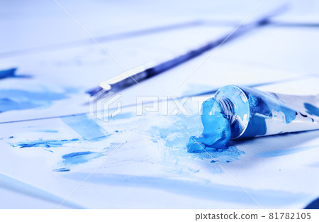 Blue tube of paint and paint brush 81782105