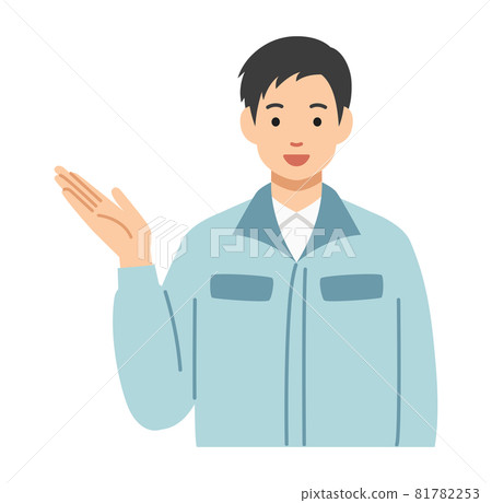 A young man in work clothes giving directions with a smile 81782253