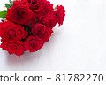 Bouquet of red roses in a corner 81782270