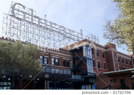 SAN FRANCISCO, CALIFORNIA, UNITED STATES - NOV 25th, 2018: Visitors in Ghirardelli Square. It's a famous landmark public square with shops and restaurants of San Francisco SAN FRANCISCO, CALIFORNIA, UNITED STATES - NOV 25th, 2018: Visitors in Ghirardelli Square. It's a famous landmark public square with shops and restaurants of San Francisco 81782396