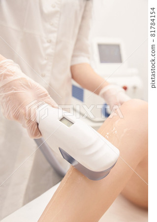 Hair laser removal service. IPL cosmetology device. Professional apparatus. Woman soft skin care 81784154