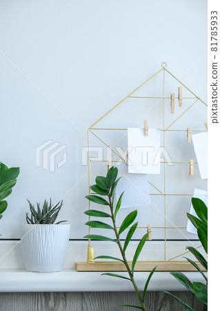 Cards and posters mock ups on grid board with green houseplants. Copy space. Hipster office table decoration. Home office desktop. Freelance bloggers workplace Cards and posters mock ups on grid board with green houseplants. Copy space. Hipster office table decoration. Home office desktop. Freelance bloggers workplace 81785933