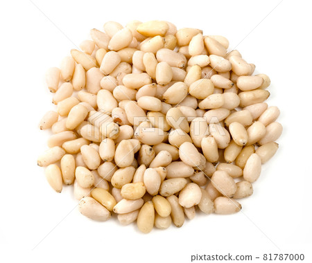handful of unpeeled pine nuts closeup on white background handful of unpeeled pine nuts closeup on white background 81787000