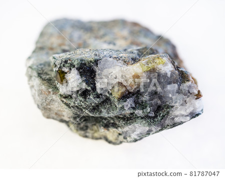 chrysoberyl crystals in rough beryl stone on white chrysoberyl crystals in rough beryl stone on white 81787047