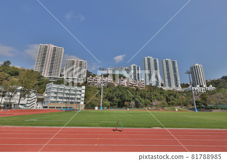 a Running track in a sports stadium, blue sky 81788985