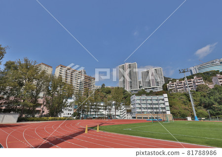 a Running track in a sports stadium, blue sky a Running track in a sports stadium, blue sky 81788986
