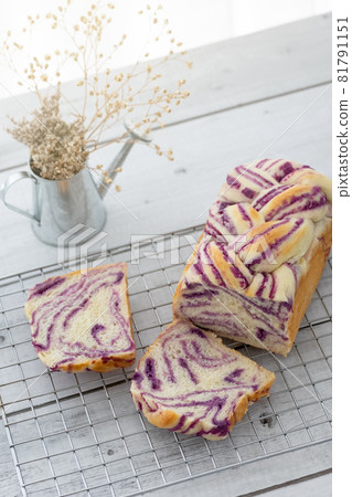 fresh baked purple sweet potato bread loaf on rack fresh baked purple sweet potato bread loaf on rack 81791151
