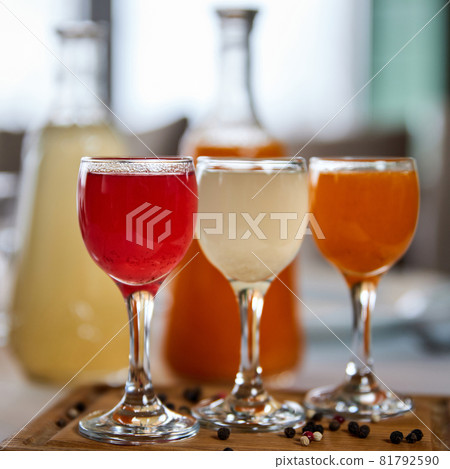 Shot of colorful alcoholic drink. Close-up, selective focus Shot of colorful alcoholic drink. Close-up, selective focus 81792590