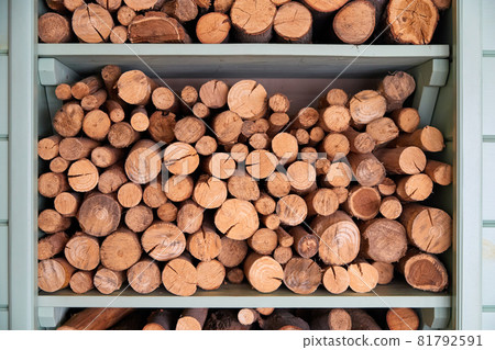 Background of firewoods in a woodshed Background of firewoods in a woodshed 81792591