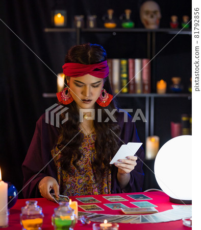 Asian witch with tarot cards Asian witch with tarot cards 81792856