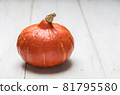 Pumpkin on white wooden background with copy space 81795580