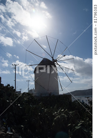 Old windmill in Mykonos, Greece. Whitewashed building Old windmill in Mykonos, Greece. Whitewashed building 81796383