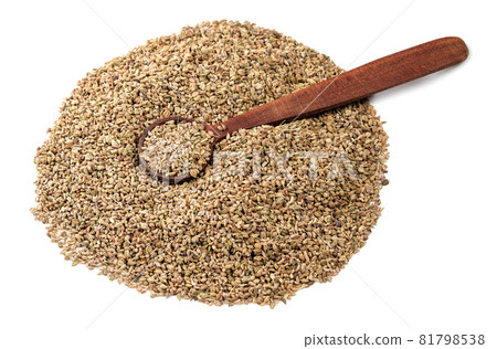wooden spoon on pile of ajowan fruits on white background 81798538
