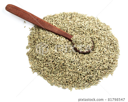 wooden spoon on pile of anise seeds on white background 81798547