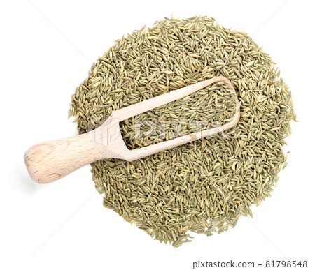 top view of wood scoop on pile of anise seeds on white background top view of wood scoop on pile of anise seeds on white background 81798548