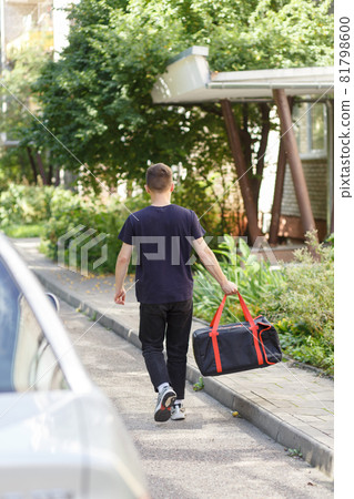 Messenger in black uniform with thermo bag Messenger in black uniform with thermo bag 81798600