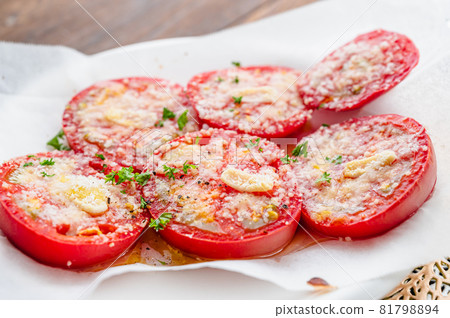 Grilled tomatoes cooked in the oven Grilled tomatoes cooked in the oven 81798894