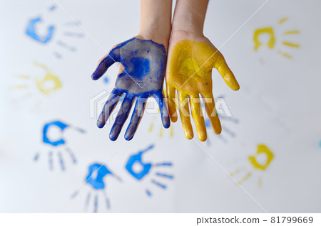 Girl hands painted with gouache, kid in workshop Girl hands painted with gouache, kid in workshop 81799669