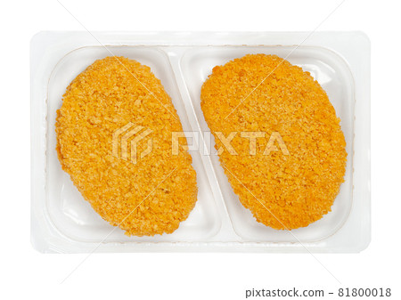 Vegan breaded cutlets, in a clear plastic tray. Slices of pre-fried schnitzel, based on soy protein, a meat substitute, in crispy breading, ready to fry. Close-up, from above, over white, food photo. Vegan breaded cutlets, in a clear plastic tray. Slices of pre-fried schnitzel, based on soy protein, a meat substitute, in crispy breading, ready to fry. Close-up, from above, over white, food photo. 81800018