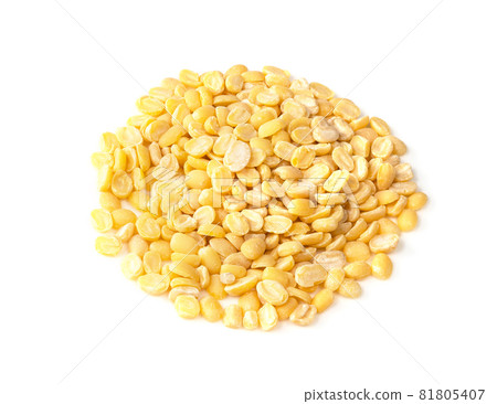 pile of raw moong dal (split green mung) beans closeup on white background 81805407
