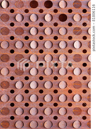 Round holes on a rusty old sheet of metal texture. Vertical image. Round holes on a rusty old sheet of metal texture. Vertical image. 81806116