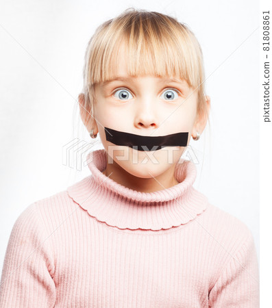 Speechless girl with tape over her mouth 81808861