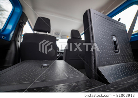 folded rear seats in car, rear view close up 81808918