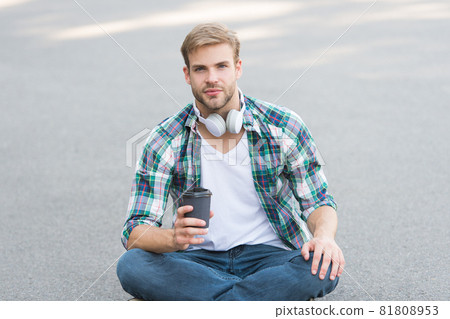 Have fun during break. Guy carefree student enjoy coffee 81808953
