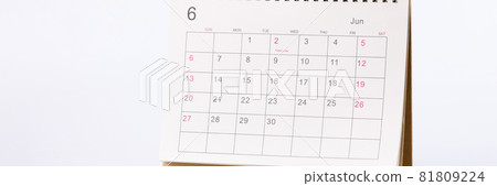 Applied paper calendar standing on white background Applied paper calendar standing on white background 81809224
